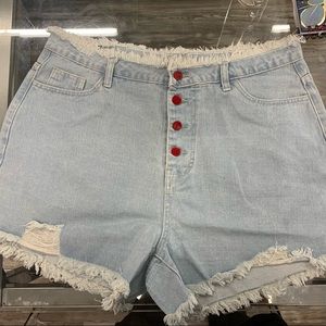 light blue jean shorts, with red buttons
